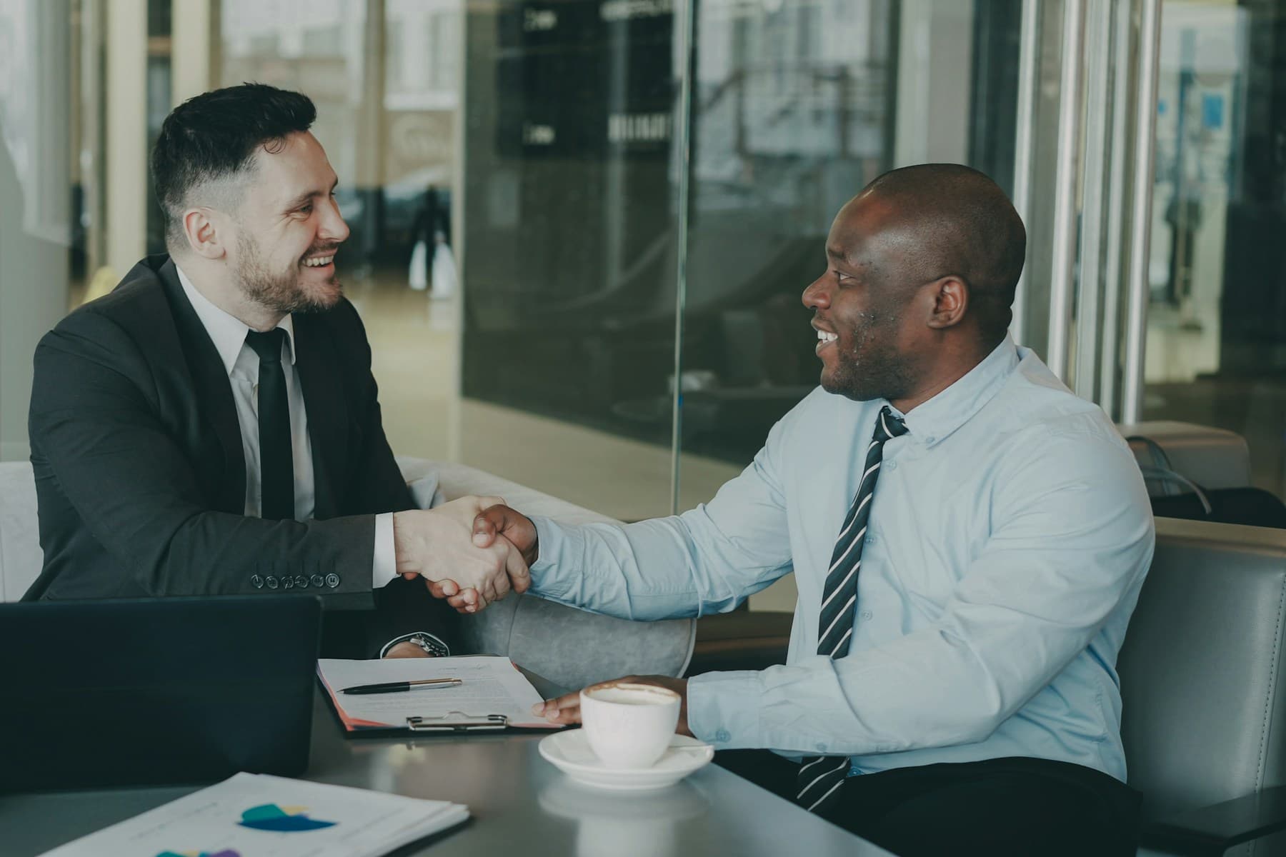 Storygame CEO and Abwab leadership handshake